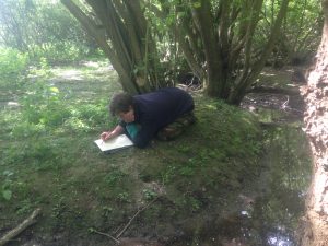 child looking at the ground