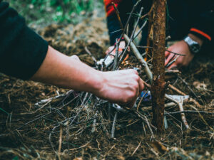 Making fire with twigs